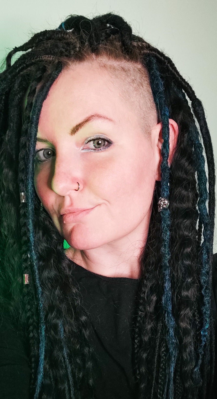 Girl with Black and Dark Green Synthetic Dreads with Curls