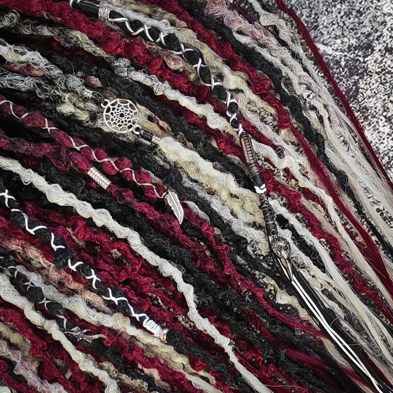 Synthetic 30-double-ended dreads in a solid black shade transitioning to red and grey ombre