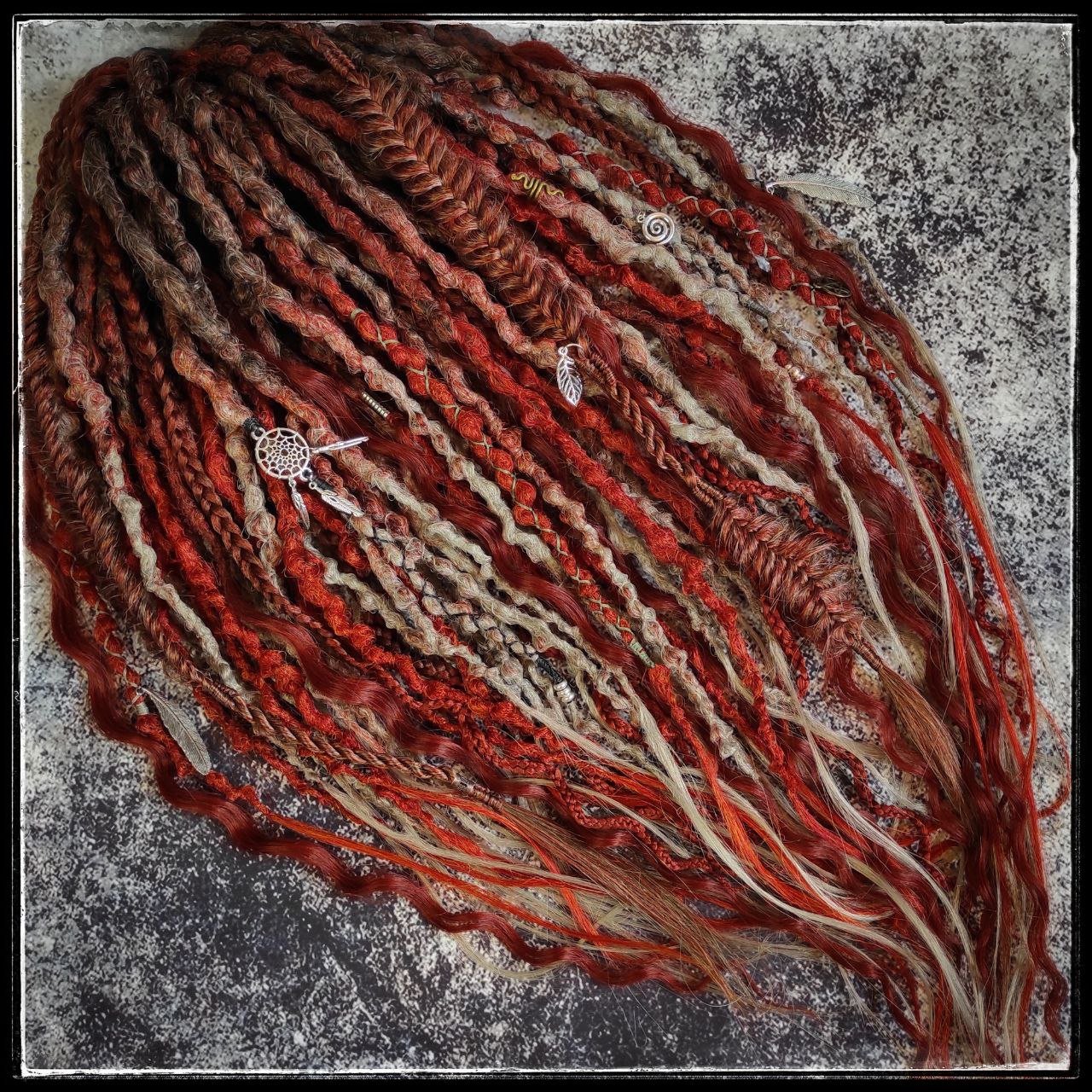 Synthetic dreads in a red ginger and gray ombre style, enhanced with curls