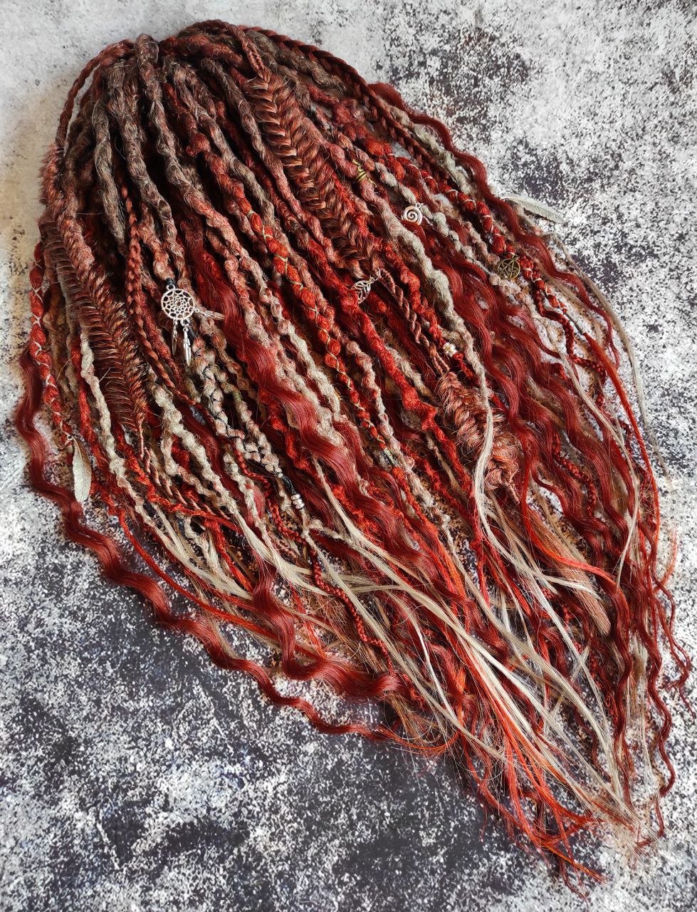 Synthetic dreads in a red ginger and gray ombre style, enhanced with curls