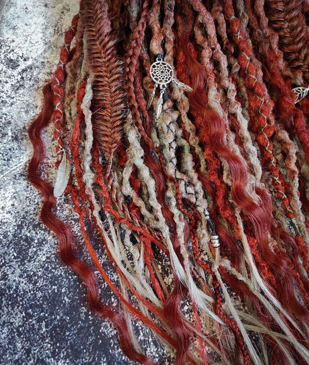 Synthetic dreads in a red ginger and gray ombre style, enhanced with curls