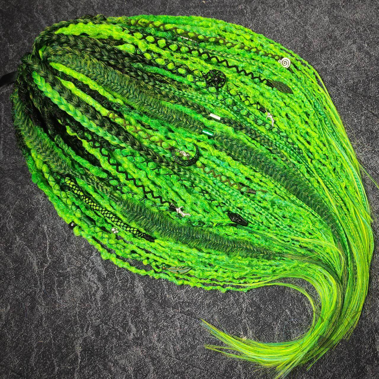 fluo green dreadlocks with braids and goth jewelry