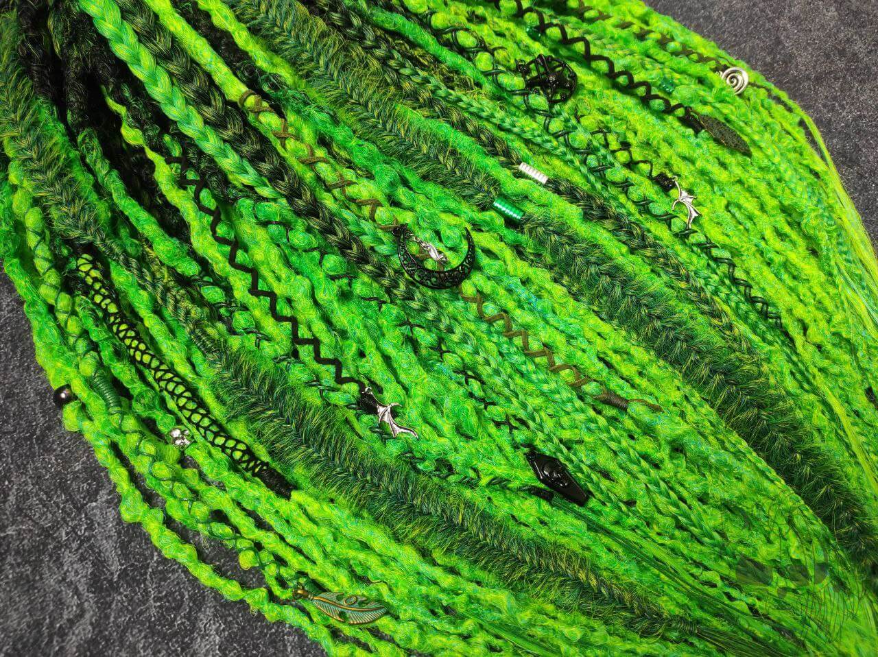 fluo green dreadlocks with braids and goth jewelry