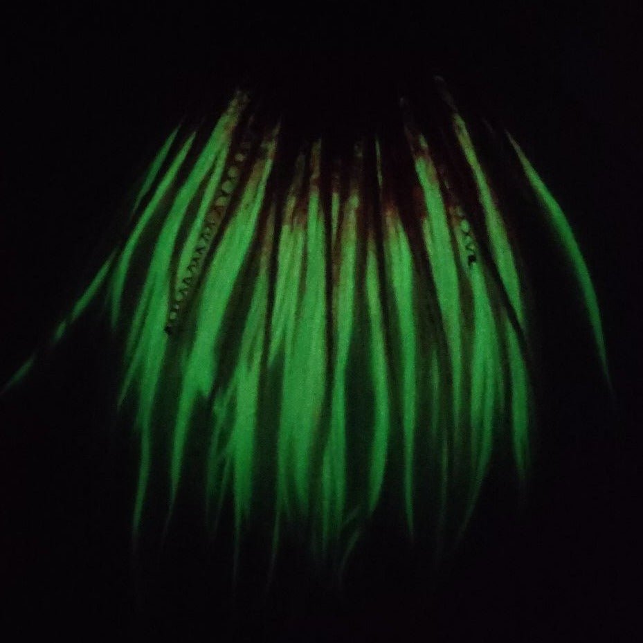 pink dreads with a luminescent effect in the dark