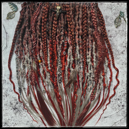 Synthetic dreads with an ombre transition from red auburn to gray, complemented by braids.
