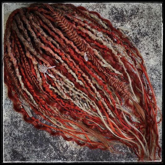 Synthetic dreads in a red ginger and gray ombre style, enhanced with curls