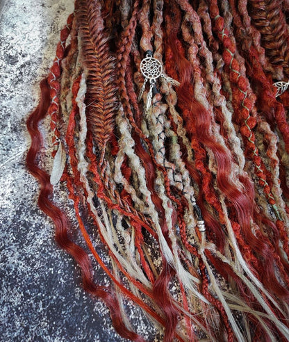 Synthetic dreads in a red ginger and gray ombre style, enhanced with curls